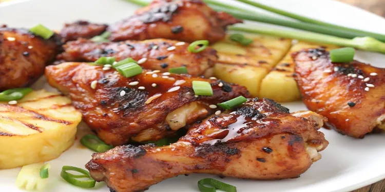 Huli Huli Chicken' (turn, turn) was invented by Ernest Morgado when he cooked teriyaki chicken for a group of farmers in 1955. This has been a Hawaiian staple with sticky rice ever since. This is my family's version of Huli Huli Chicken. Use aji mirin (sweet rice wine) in place of sherry if desired