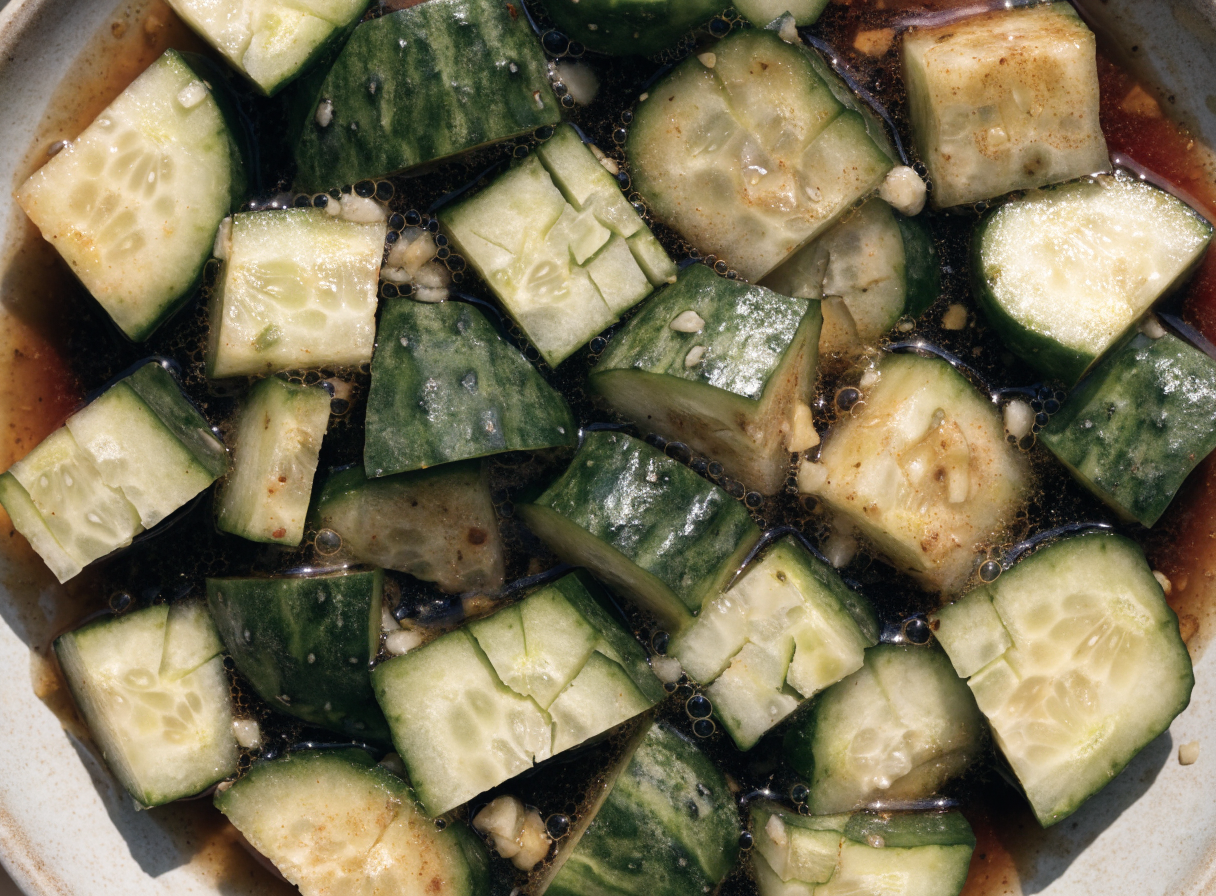 Why do you smash cucumbers in a salad? step 2 - A detailed top-down food photography sho